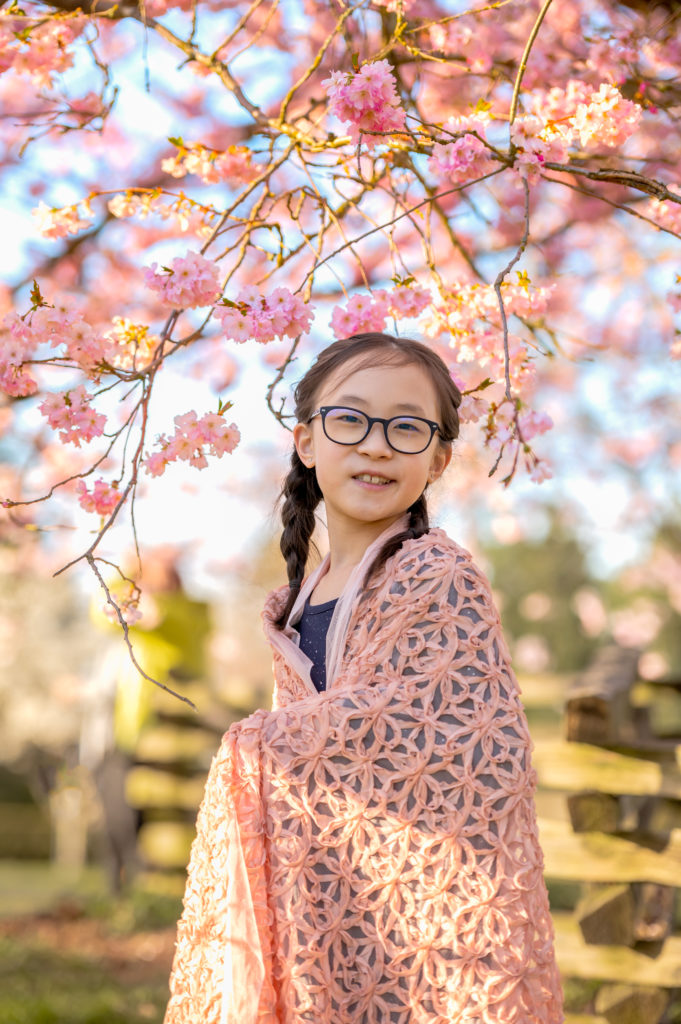 Photo of a girl with the cherry blossoms Vancouver